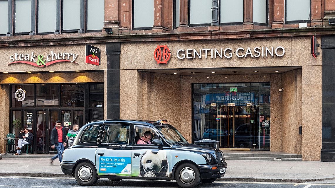 A taxi sits in front of a Genting Casino property in the UK